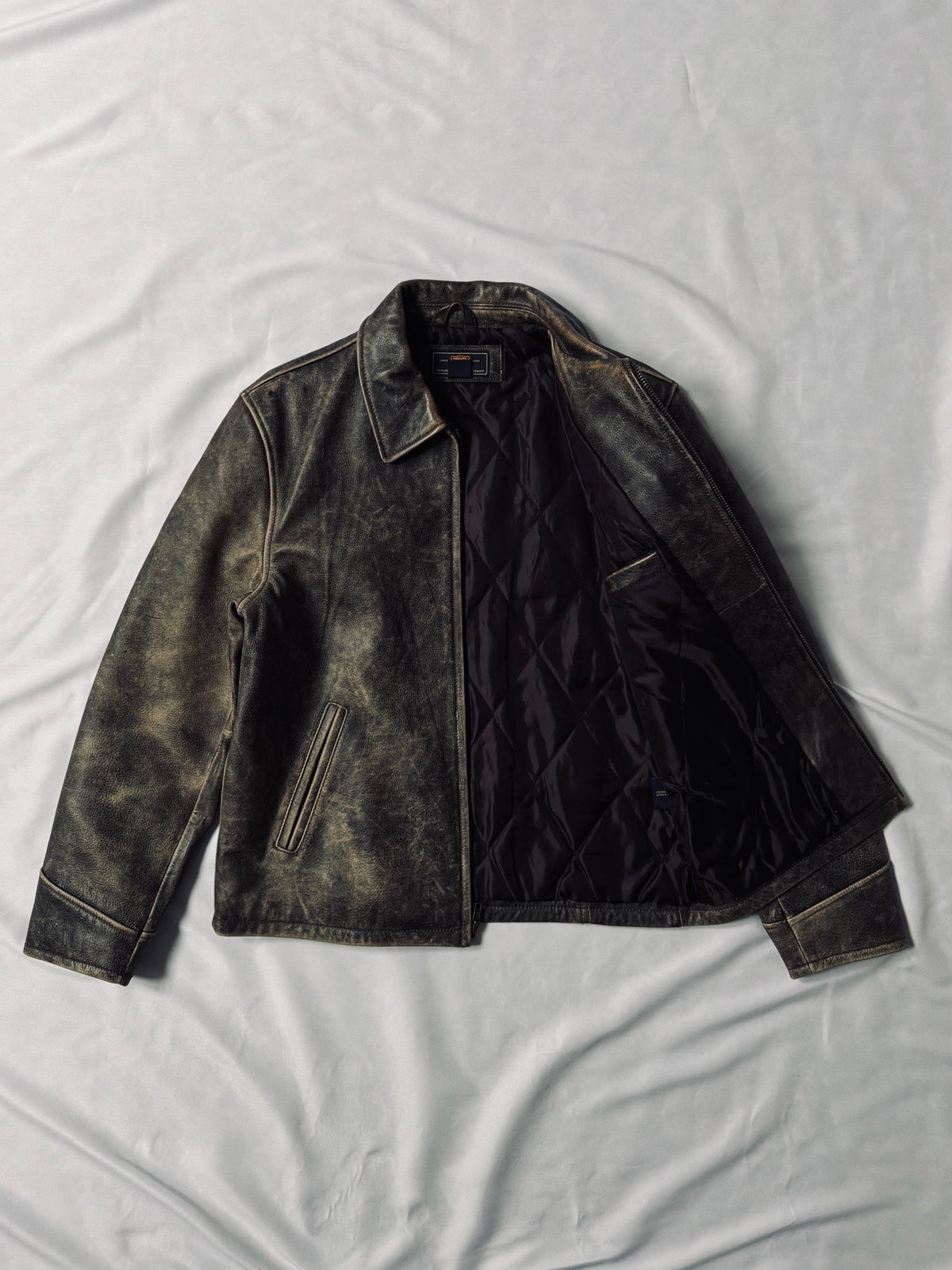 Vintage heavily distressed leather jacket