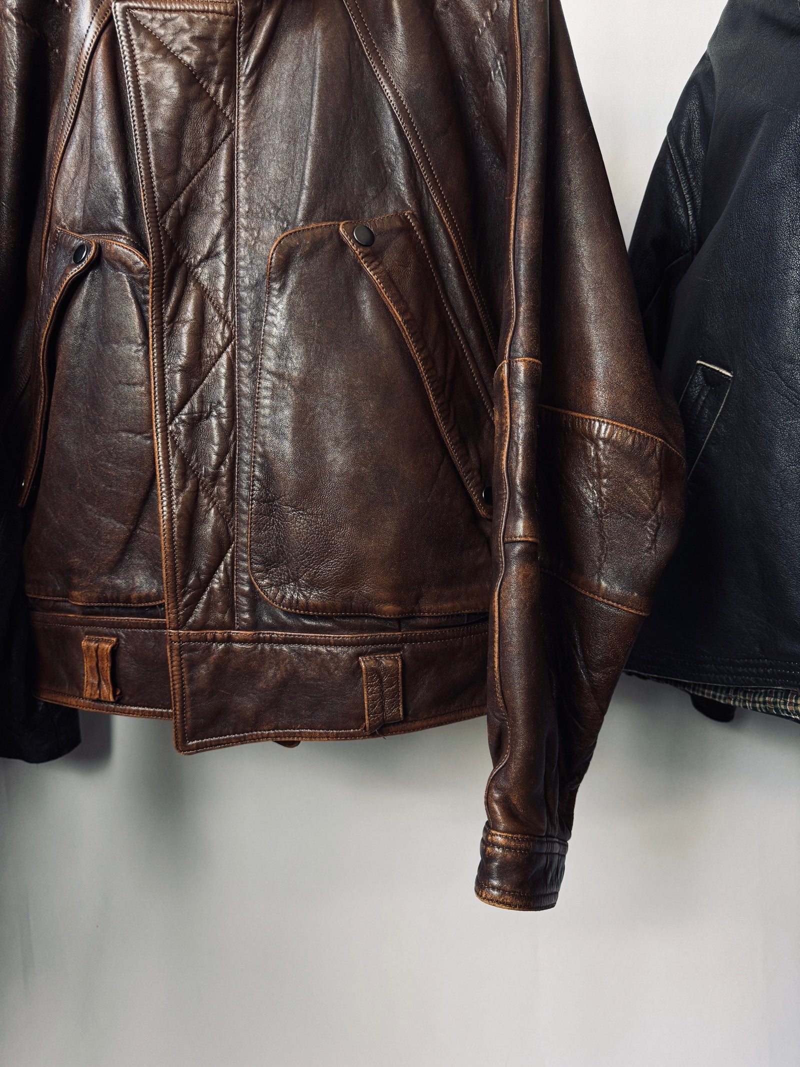 Heavy asymetric brown 90s leather jacket
