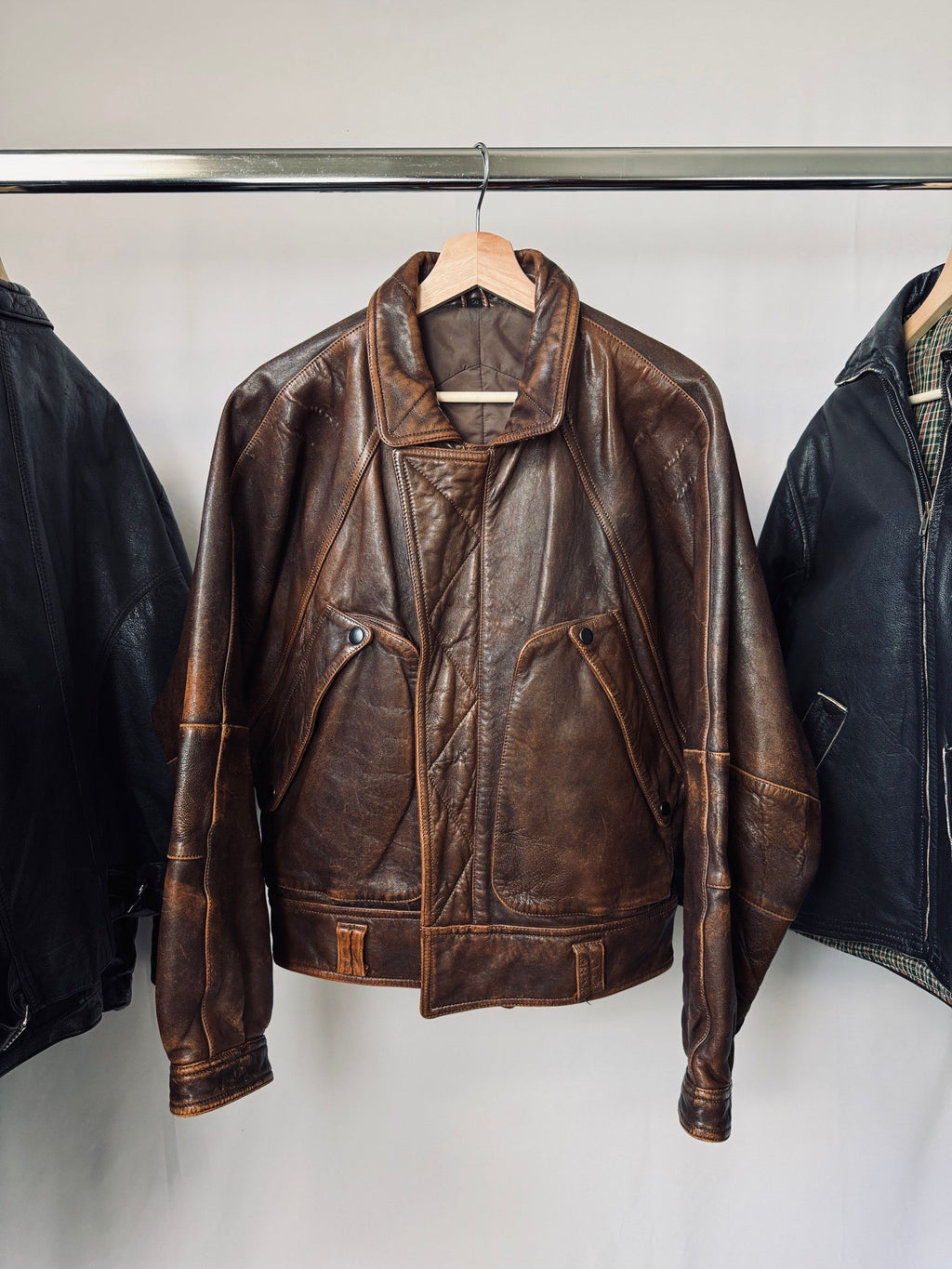Heavy asymetric brown 90s leather jacket