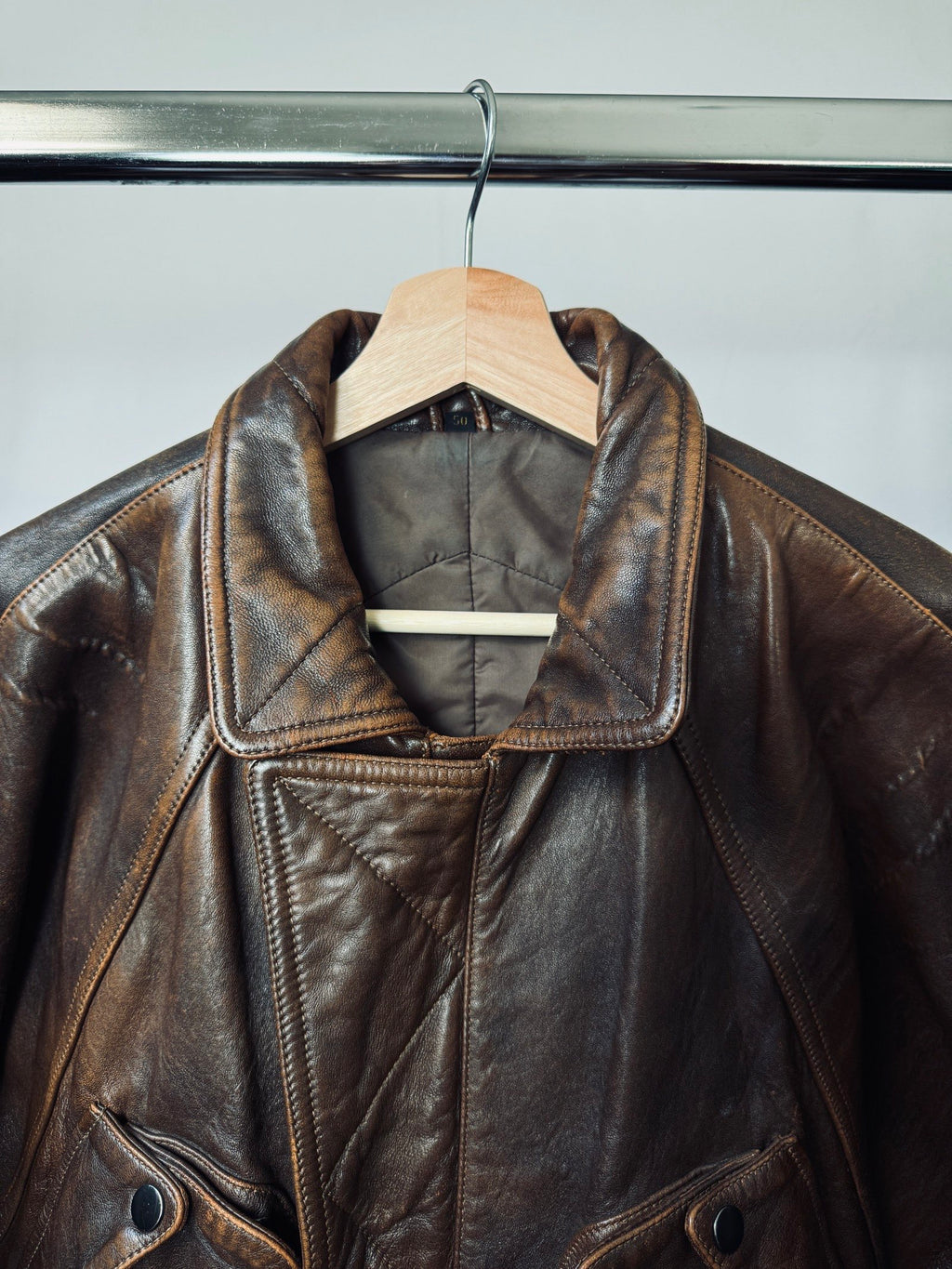 Heavy asymetric brown 90s leather jacket