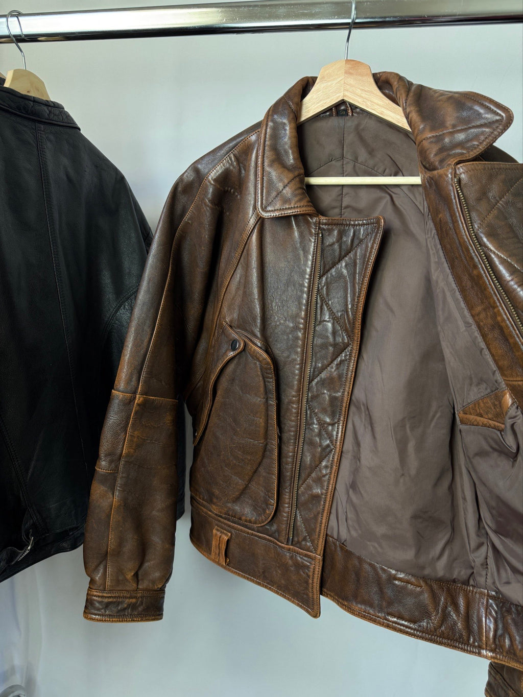 Heavy asymetric brown 90s leather jacket