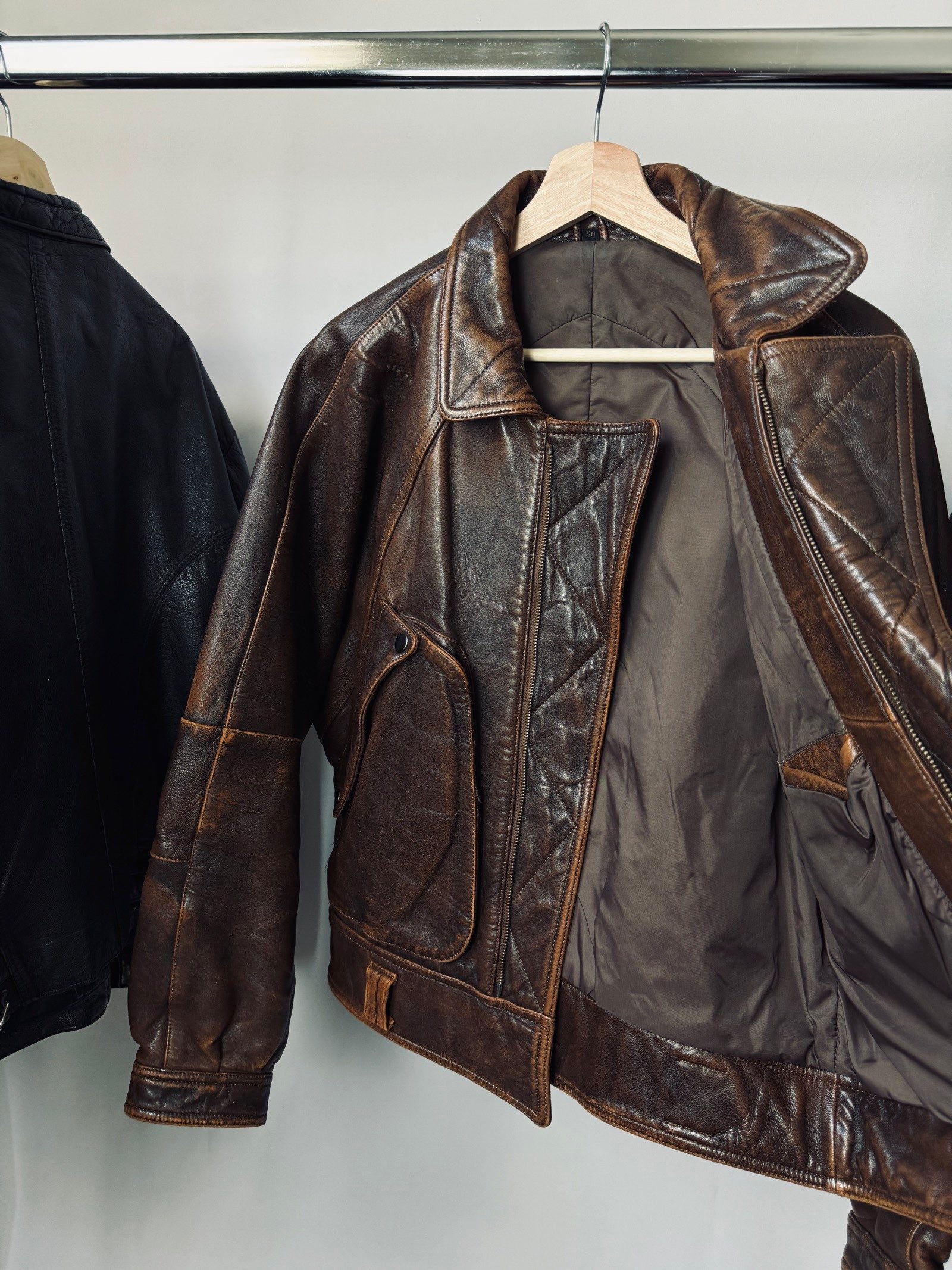 Heavy asymetric brown 90s leather jacket