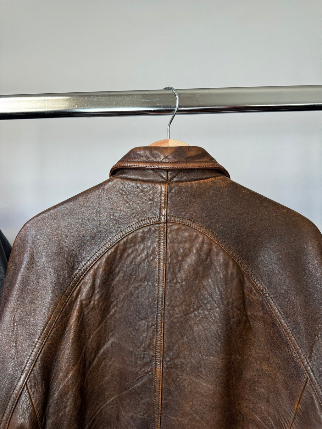 Heavy asymetric brown 90s leather jacket