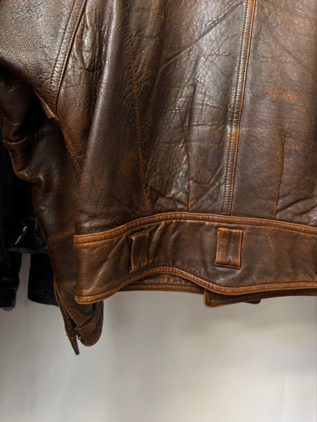 Heavy asymetric brown 90s leather jacket